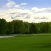 A view of the 13th green with water coming into play from left at Lyman Orchards Golf Club - Jones Course