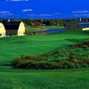 A view of green and clubhouse at Ranch Golf Club