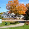 A fall view of the clubhouse at Foster Country Club