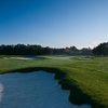 A view of the 8th green protected by bunkers at Penobscot Valley Country Club