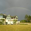 A view of rainbow over the clubhouse at Lake Winnipesaukee Golf Club
